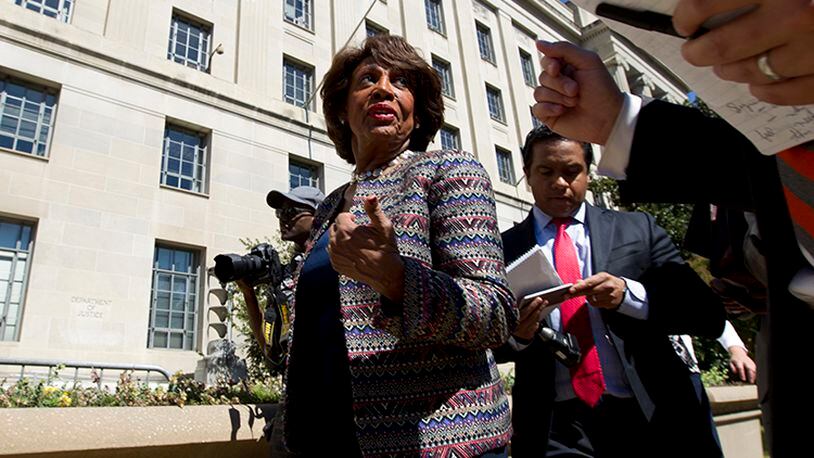 In this Sept. 22, 2016 file photo, Rep. Maxine Waters D-Calif., accompanied by other members of the Congressional Black Caucus (CBC),  speaks to the media outside of the Justice Department in Washington. Waters has served in Congress for a quarter-century. Now she's turned into the passionate voice of resistance against the Trump administration.