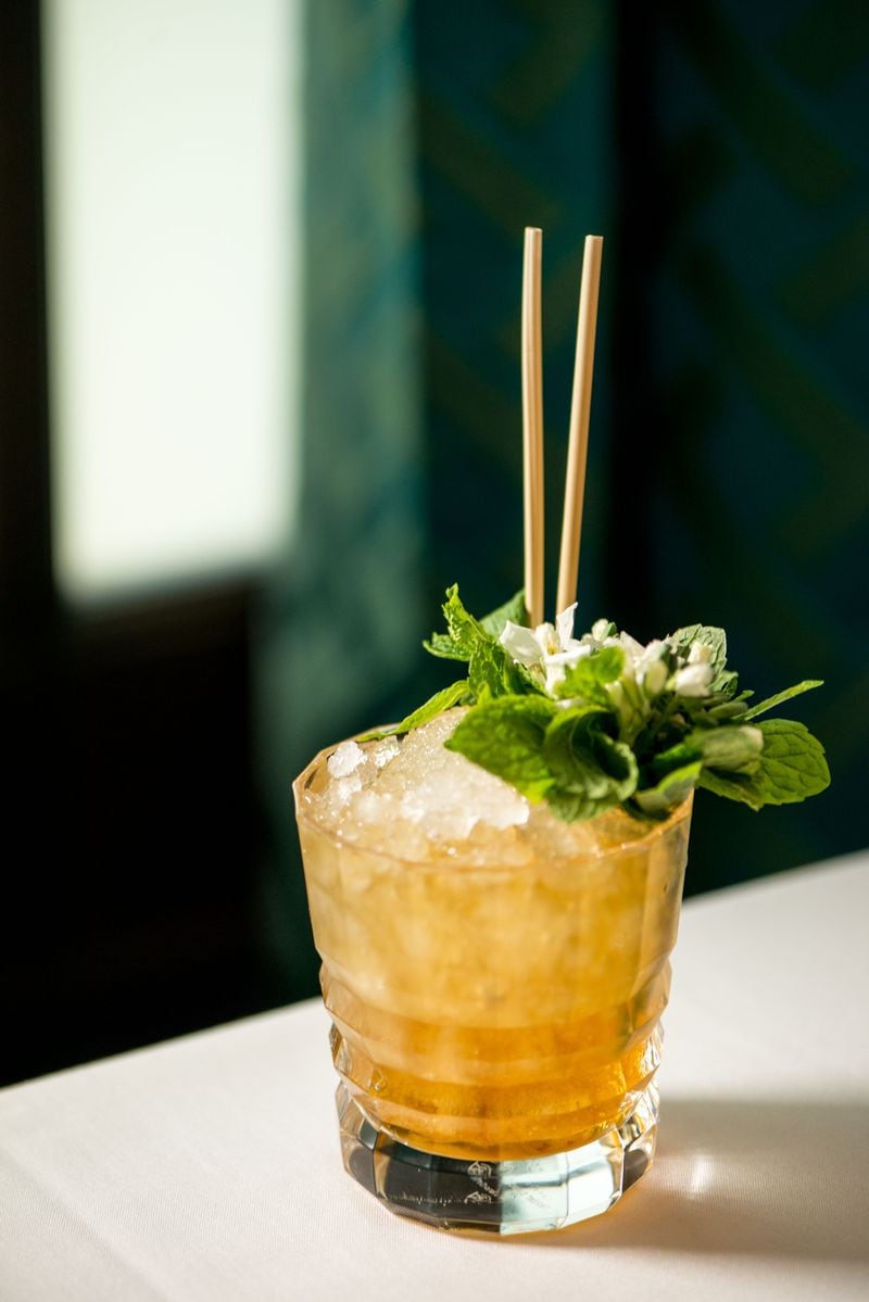 The addition of honeysuckle essence lends a floral, aromatic tasting experience in Atlas' North Georgia Julep.