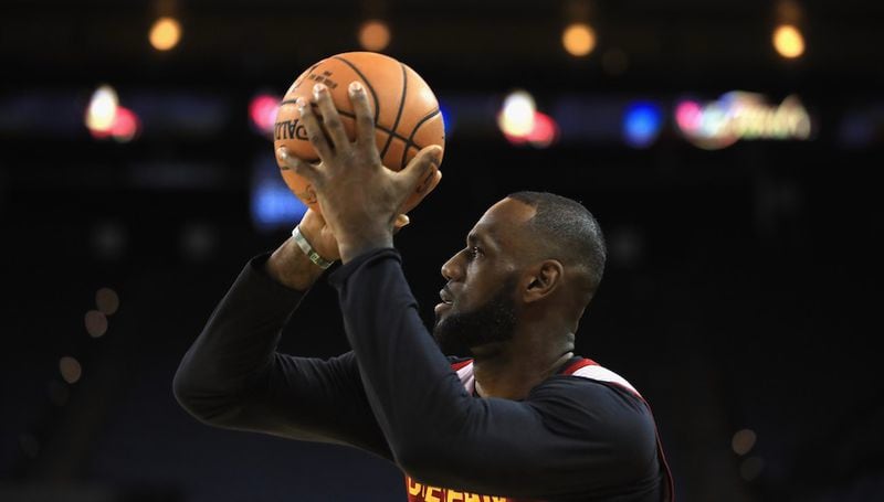 LeBron James works out during a practice for the 2017 NBA Finals at ORACLE Arena on May 31, 2017 in Oakland, California. “Being black is not a burden,” said Andrew Young of James. “Being exceptional is.” (Photo by Ezra Shaw/Getty Images)