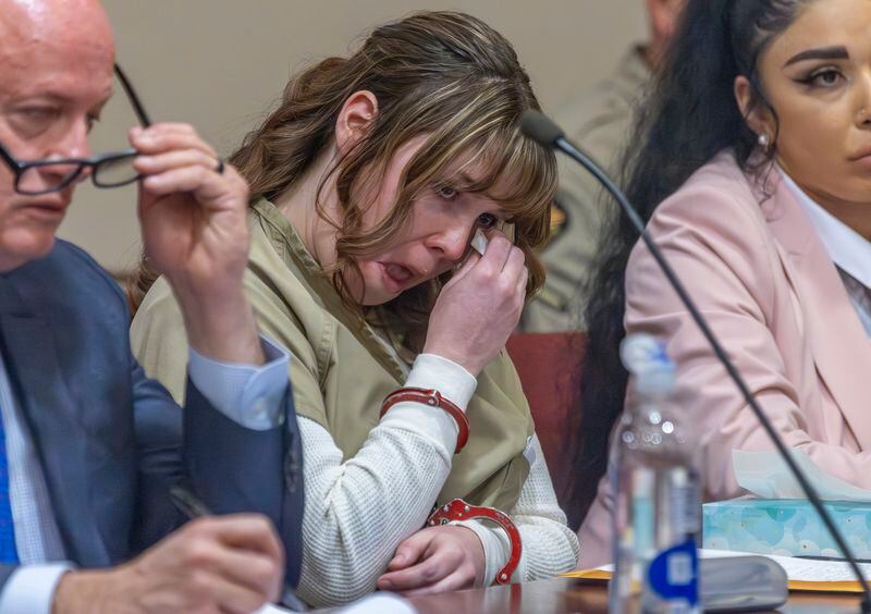 Hannah Gutierrez-Reed wipes her tears at her sentencing hearing in state district court in Santa Fe, New Mexico, on Monday, April 15, 2024. Gutierrez-Reed, the armorer on the set of the Western film "Rust," was sentenced to 18 months in prison for involuntary manslaughter in the death of cinematographer Halyna Hutchins, who was fatally shot by Alec Baldwin in 2021. (Luis Sánchez Saturno/Santa Fe New Mexican via AP, Pool)