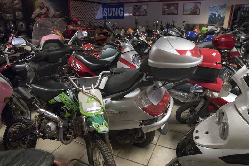 Dirt bikes, scooters and ATVs wait for repairs at Hitech Motorsports in Atlanta’s West End neighborhood on Wednesday, July 11, 2018 . (ALYSSA POINTER/ALYSSA.POINTER@AJC.COM)