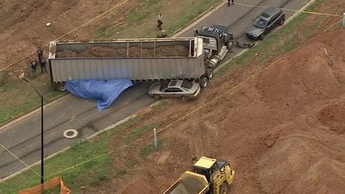 One person was killed Wednesday afternoon after being run over by a tractor-trailer in a Paulding County neighborhood, according to police.