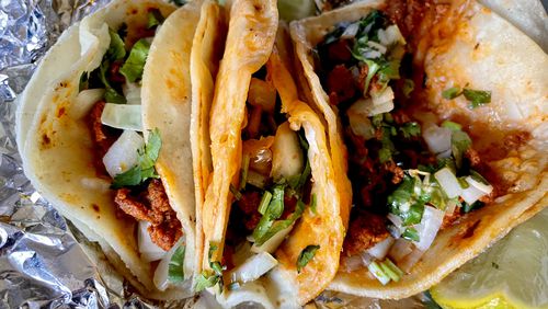The mini chorizo tacos at El Taco Naco are bliss-inducing. Angela Hansberger for The Atlanta Journal-Constitution