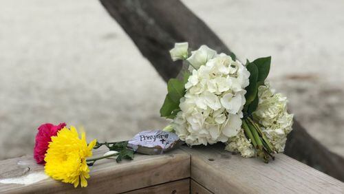 Someone left flowers at Massengale Park on St. Simons Island, Georgia, where two people drowned on Mother’s Day. (Photo by ActionNewsJax.com)