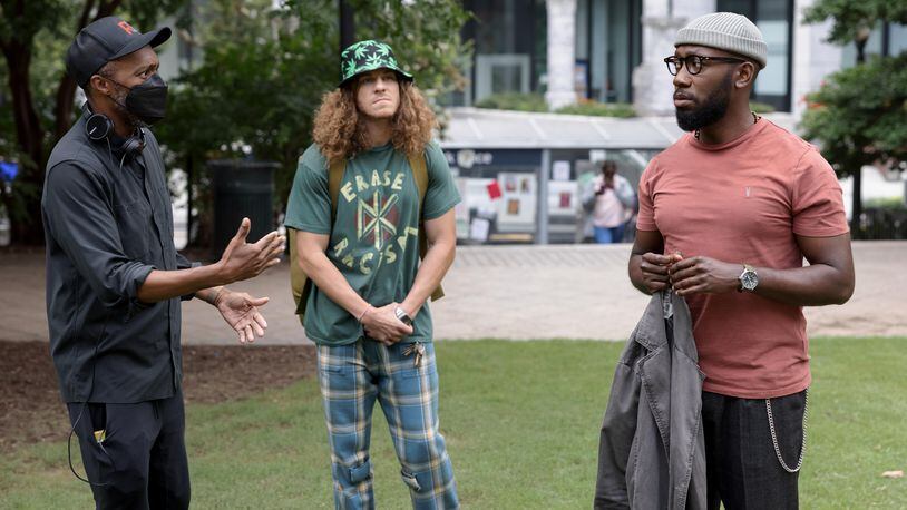 After a year of rising as a prominent activist, Keef draws a strip that sparks a protest headlined by him. But can he live up to his new platform? Director Maurice Marable, Gunther (Blake Anderson) and Keef Knight (Lamorne Morris), shown in downtown Atlanta, pretending to be San Francisco. (Photo by: Steve Swisher/Hulu)