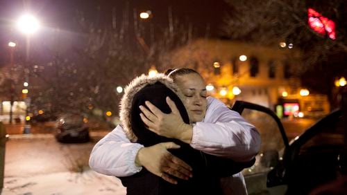 Joy Friedman hugs a woman named Lisa who was working as a prostitute in Minneapolis. Friedman was a women’s programs manager for Breaking Free, a St. Paul-based nonprofit that helps women who want to leave the sex trade. (AP Photo/The Star Tribune, Jeff Wheeler)