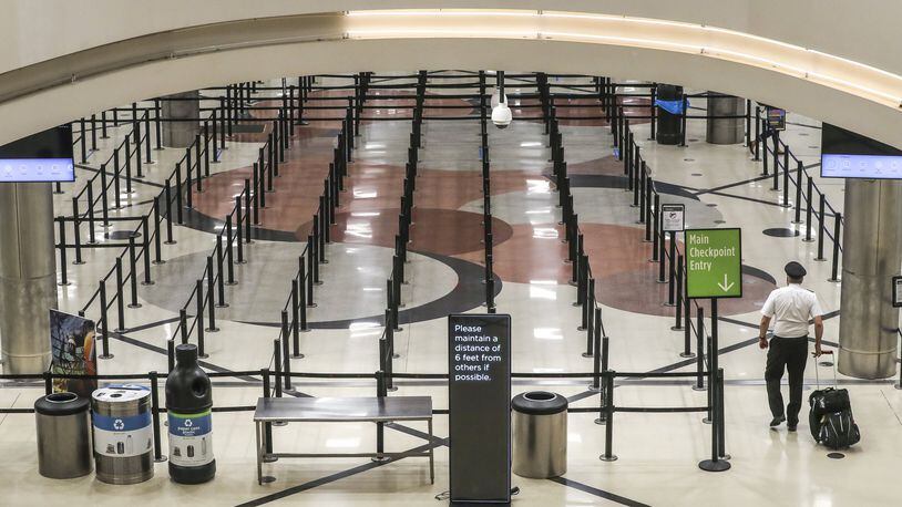 A nearly empty Hartsfield-Jackson International Airport on Thursday April 9, 2020. JOHN SPINK/JSPINK@AJC.COM