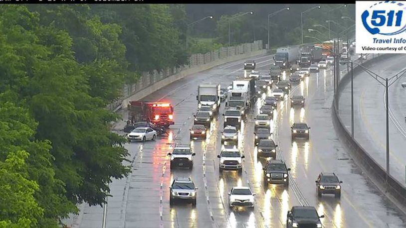 The WSB Jam Cam shows a crash in the rain on Wednesday, May 12th, 2021 on I-20/westbound near Candler Road in DeKalb County. Credit: @ajcwsbtraffic