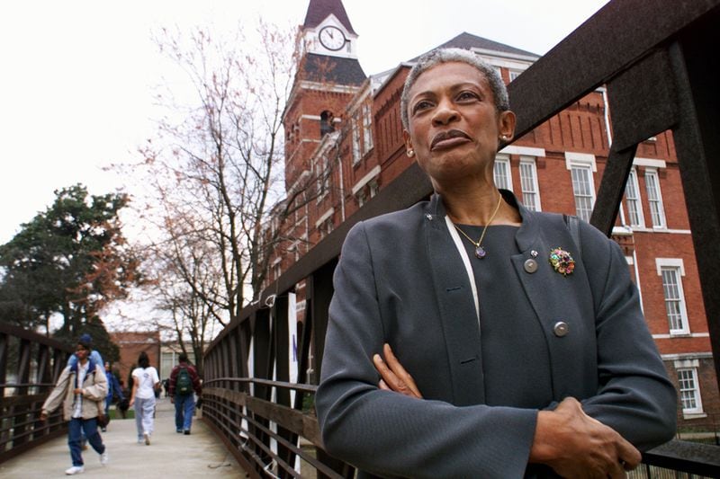 Dr. Dolores Cross on the Morris Brown campus bridge over MLK Drive in 1999, the year she became president of the school. (JOHN SPINK / AJC file)