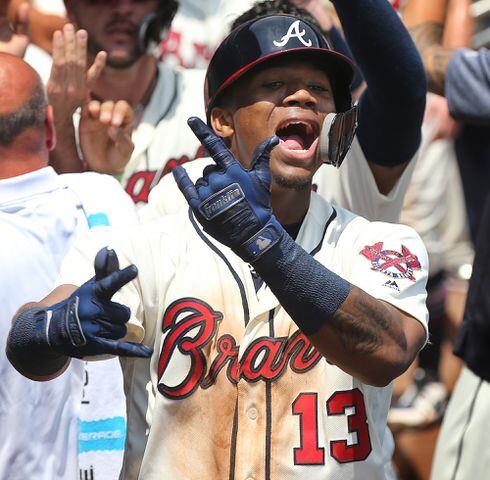 Photos: Braves try to outscore Brewers