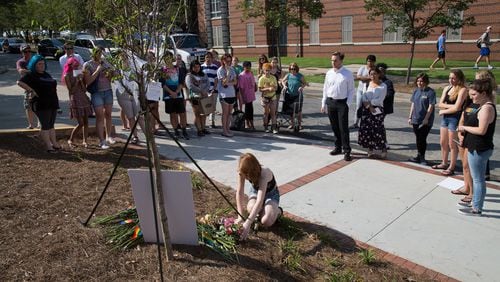 A small group of people gather at a memorial for Georgia Tech student Scout Schultz Sunday, Sept. 17, 2017, in Atlanta. Schultz, an engineering student at Georgia Tech, was shot by Georgia Tech campus police after telling officers to shoot. STEVE SCHAEFER / SPECIAL TO THE AJC