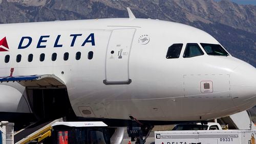 A Delta Air Lines Airbus A319 sits on the tarmac at the Jackson Hole airport in Jackson Hole, Wyoming, U.S., on Wednesday, Aug. 25, 2010.