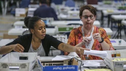 Kristi Royston (right) was hired as Gwinnett County’s new election director. JOHN SPINK/JSPINK@AJC.COM