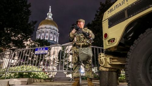 July 8, 2020 Atlanta: Specialist, OÄôDonnell was posted guard in front of the Georgia State Capitol building on Wednesday, July 8, 2020, after the Georgia National Guard were dispatched in response to last weekendÄôs surge of violence in Atlanta and the ransacking of the Georgia State PatrolÄôs headquarters, according to their commander. So far, they have not made any arrests and no Guardsmen have been injured. Riding in Humvees, the troops, who are armed will be out on duty again Thursday evening in keeping with the emergency declaration Gov. Brian Kemp issued following the shootings that left five dead in Atlanta, including an 8-year-old girl. Set to expire July 13, KempÄôs order empowers the Guardsmen to apprehend lawbreakers. The Guardsmen stood watch at the state Capitol in downtown Atlanta, the GovernorÄôs Mansion in Buckhead and the recently vandalized Department of Public Safety building in southeast Atlanta. The troops are seeking to free up police for other law enforcement duties, said Maj. Gen. Thomas Carden Jr., GeorgiaÄôs adjutant general. Citing security concerns, Carden declined to say precisely how many Guardsmen have been deployed, though KempÄôs order calls for up to 1,000. Kemp, a Republican, issued the emergency order after threatening late Sunday to Äútake actionÄù to curb the unrest in Atlanta if Mayor Keisha Lance Bottoms failed to do so. ÄúPeaceful protests were hijacked by criminals with a dangerous, destructive agenda. Now, innocent Georgians are being targeted, shot, and left for dead,Äù Kemp said. ÄúThis lawlessness must be stopped and order restored in our capital city.Äù The mayor, who confirmed Monday she tested positive for the coronavirus, said she disagreed with Kemp's decision and at Äúno timeÄù requested the help. JOHN SPINK/JSPINK@AJC.COM