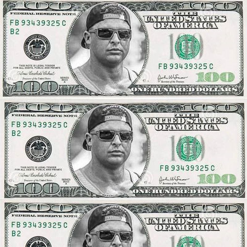 $100 bills with Ochle’s face pulled from his Freakstep website. 