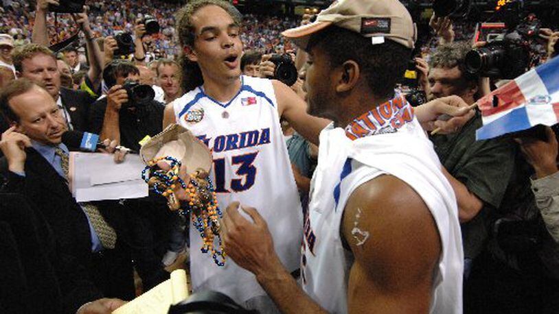 Joakim Noah and Al Horford celebrate at the Georgia Dome in 2007 after winning back-to-back championships for Florida. (Rich Addicks/AJC)