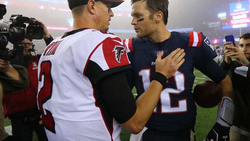 October 22, 2017 Foxborough: Falcons quarterback Matt Ryan and Patriots quarterback Tom Brady greet each other after the Patriots defeated the Falcons 23-7 during their Super Bowl rematch in a NFL football game on Sunday, October 22, 2017, in Foxborough.   Curtis Compton/ccompton@ajc.com