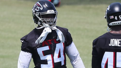 Falcons linebackers Foyesade Oluokun (left) and Deion Jones work together during OTAs Tuesday, May 25, 2021, at the team training facility in Flowery Branch. (Curtis Compton / Curtis.Compton@ajc.com)