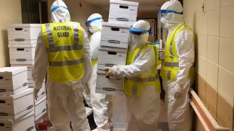 The Georgia National Guard was sent to help decontaminate Pelham Parkway Nursing Home, where at least 20 patients are known to have been infected with the coronavirus. Gov. Kemp posted this photo on Twitter.