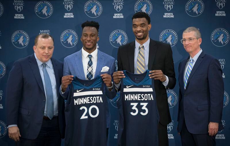 The Minnesota Timberwolves, including head coach Tom Thibodeau, left, and general manager Scott Layden, right, introduce the team's 2018 draft picks No. 20 Josh Okogie (20th overall), and No. 33 Keita Bates-Diop (48th overall) during a news conference on Tuesday, June 26, 2018, at the Mayo Clinic Square in Minneapolis. (Elizabeth Flores/Minneapolis Star Tribune/TNS)