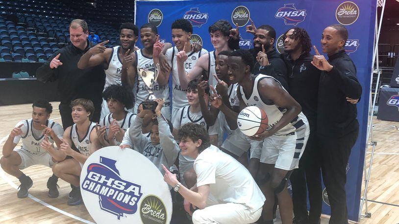 The Pace Academy boys celebrate their third state championship in four seasons. The Knights beat Fayette County 66-54 in the Class 4A final at the Macon Coliseum, March 8, 2023.
