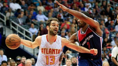 Jose Calderon of the Atlanta Hawks drives to the basket past John Wall of the Washington Wizards along the baseline during the second quarter against the Washington Wizards in Game 4 of the Eastern Conference Quarterfinals during the 2017 NBA Playoffs at Philips Arena on April 24, 2017 in Atlanta, Georgia. (Photo by Daniel Shirey/Getty Images)