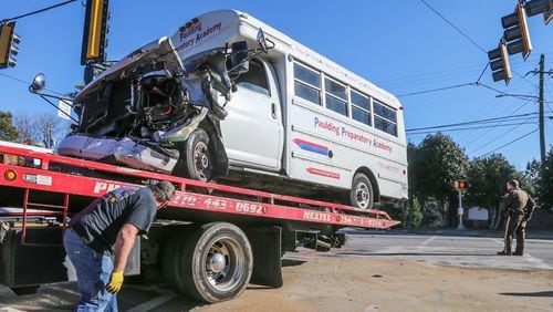 A Paulding Preparatory Academy bus was in a crash with a truck in Paulding County. JOHN SPINK / JSPINK@AJC.COM
