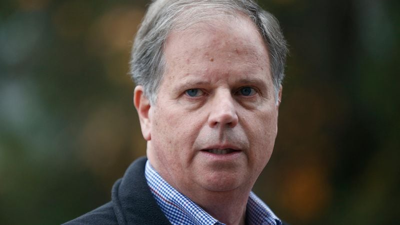 In this Dec. 4, 2017, file photo, then-Democratic senatorial candidate Doug Jones speaks at a news conference in Dolomite, Ala. Jones, the first Alabama Democrat elected to the Senate in a quarter century, is one of two new members who will take the oath of office on the Senate floor at noon on Jan. 3, 2018. (AP Photo/Brynn Anderson, File)