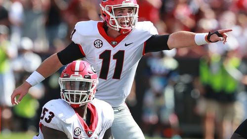 UGA QB Jake Fromm calls an audible at the line of scrimmage against South Carolina during the first half in a NCAA college football game on Saturday, Sept 8, 2018, in Columbia.  Curtis Compton/ccompton@ajc.com