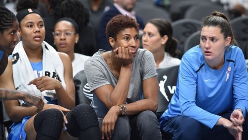 Atlanta Dream forward Angel McCoughtry (center) watches with teammates during the first half of WNBA basketball game at State Farm Arena in Atlanta on Wednesday, June 19, 2019. Atlanta Dream won 88-78 over the Indiana Fever. HYOSUB SHIN / HSHIN@AJC.COM