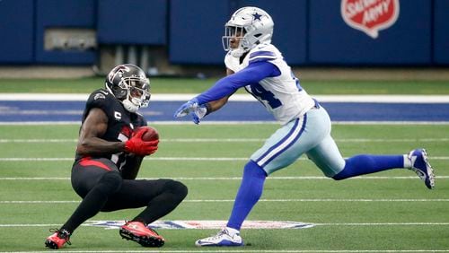 Falcons wide receiver Olamide Zaccheaus (17) catches a pass in front of Dallas cornerback Chidobe Awuzie (24) in the second half Sunday, Sept. 20, 2020, in Arlington, Texas. (Ron Jenkins/AP)