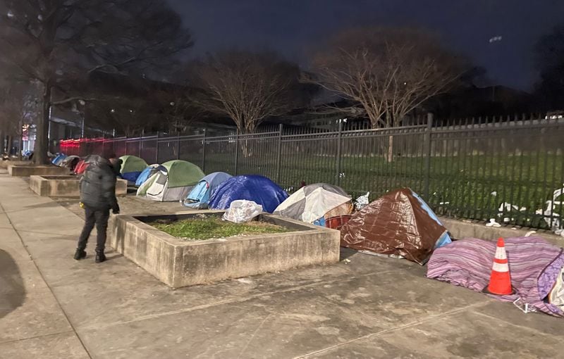 A homeless encampment of about 25 tents sits along Central Avenue, across from the Fulton County Courthouse. (Photo by Bill Torpy)