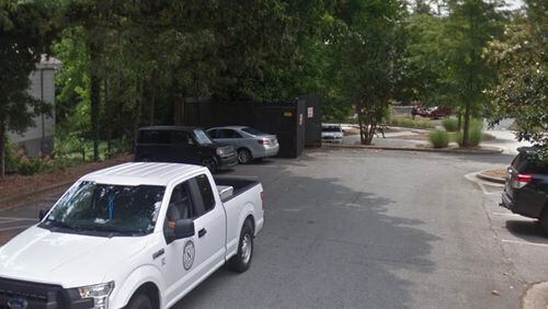 Norcross recently changed course on plans to add a trash compactor enclosure behind Paizanos restaurant at 7 Jones St. and will keep the existing dumpsters. (Google Maps)