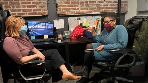 Amanda Washington (right), National New Play Network producer at Actor’s Express, meets with the company’s finance director, Marysa Sutton, to discuss a growing list of community engagement projects.