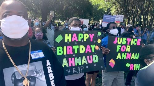 Some attending the rally carried birthday signs for Ahmaud Arbery, who would have turned 26 Friday. (Photo: Bert Roughton)