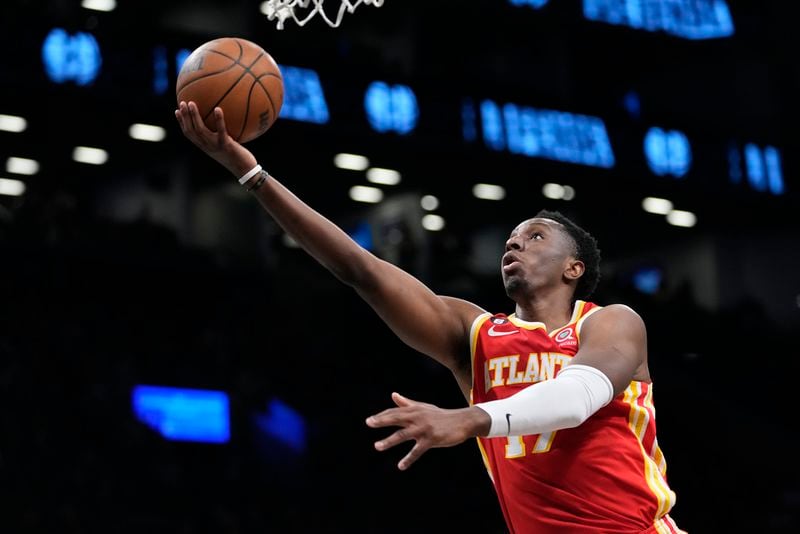 Atlanta Hawks forward Onyeka Okongwu goes to the basket during the first half of the team's NBA basketball game against the Brooklyn Nets, Friday, March 31, 2023, in New York. (AP Photo/Mary Altaffer)