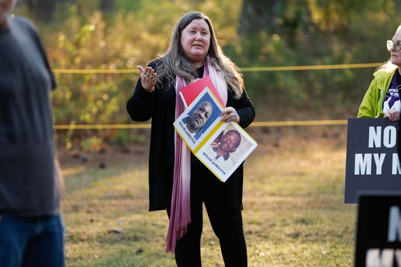 Mary Catherine Johnson, a board member at Georgians for Alternatives to the Death Penalty, spoke during a vigil for death row inmate Willie Pye ahead of his execution Wednesday, March 20, 2024. (Natrice Miller/ Natrice.miller@ajc.com)