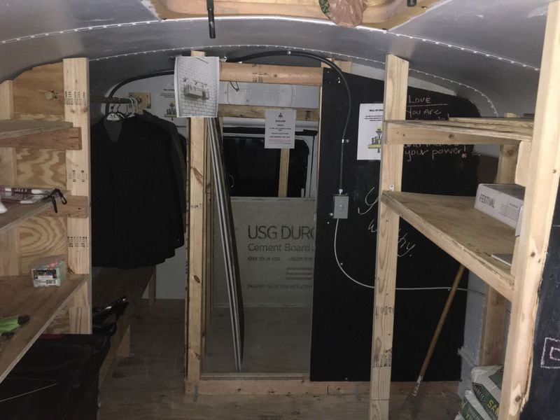 The inside of the Dignity Bus shows where construction has started on spaces designated for the shower, closet, and storage.