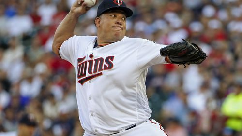 Minnesota Twins starting pitcher Bartolo Colon throws to the New York Yankees in the first inning of a baseball game Tuesday, July 18, 2017, in Minneapolis. (AP Photo/Bruce Kluckhohn)