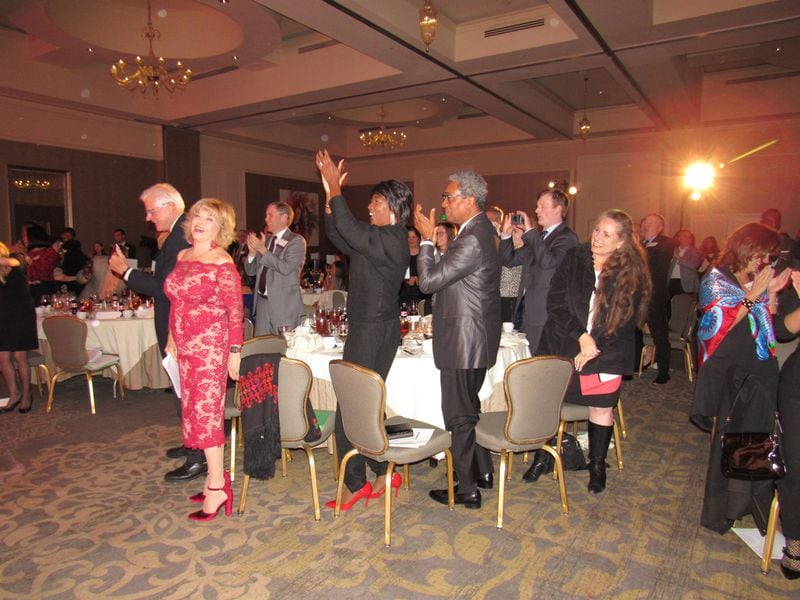 The audience gives Mike Luckovich a standing ovation after his little acceptance speech/dance/cartoon creation. Pat Mitchell (left), Morse Diggs (center) and Maria Saporta are readily in view. CREDIT: Rodney Ho/rho@ajc.com.