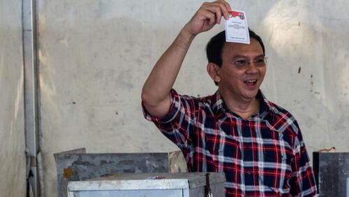 Former Jakarta Gov. Basuki ‘Ahok’ Tjahaja Purnama shows his ballot after voting in the Jakarta Governal Election in February in Jakarta, Indonesia.  Ahok was sentenced to jail after his conviction  on charges of insulting Islam.