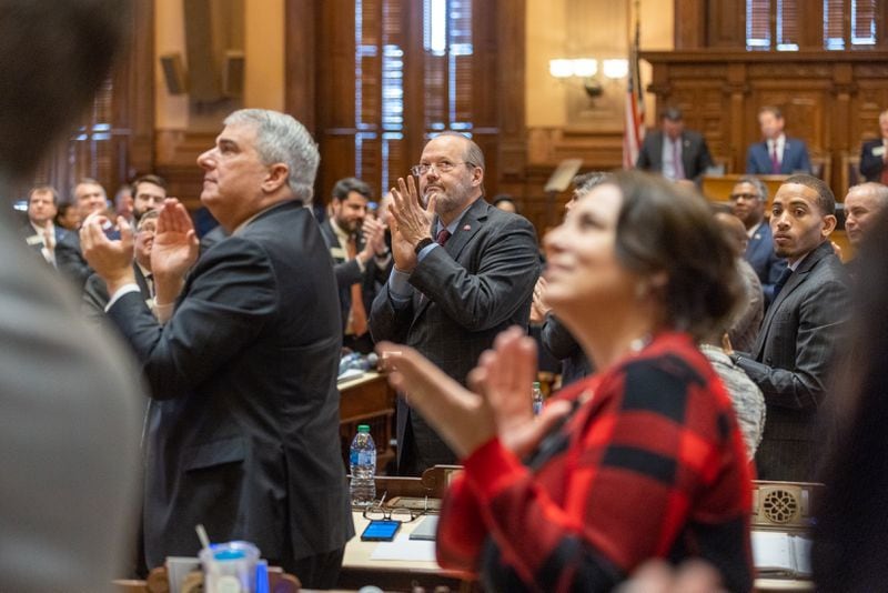 Legislators clap during the State of the State speech at the Capitol in Atlanta on Wednesday, January 25, 2023. (Arvin Temkar / arvin.temkar@ajc.com)