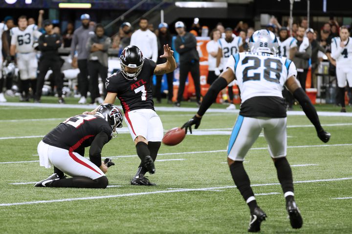 Falcons kicker Younghoe Koo boots the winning field goal in overtime against the Panthers on Sunday in Atlanta. The Falcons won 37-34. (Miguel Martinez / miguel.martinezjimenez@ajc.com)