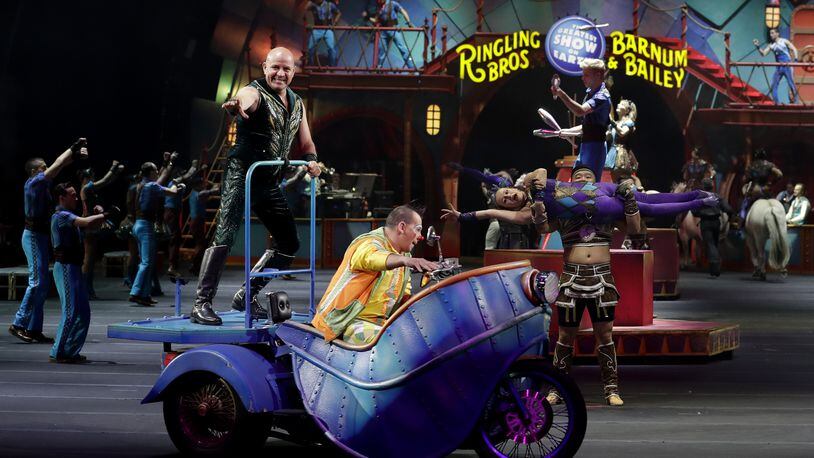 Ringling Bros. and Barnum & Bailey performers begin a show Saturday, Jan. 14, 2017, in Orlando, Fla. The Ringling Bros. and Barnum & Bailey Circus will end the "The Greatest Show on Earth" in May, following a 146-year run of performances. Kenneth Feld, the chairman and CEO of Feld Entertainment, which owns the circus, told The Associated Press, declining attendance combined with high operating costs are among the reasons for closing. (AP Photo/Chris O'Meara)