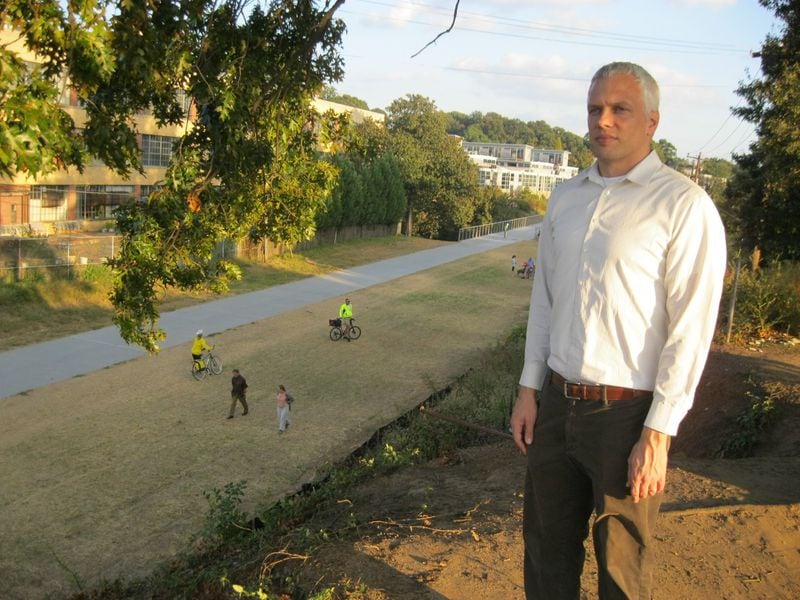 Ryan Gravel, the former Georgia Tech student whose doctoral thesis was the blueprint for Atlanta’s Beltline, stands on his favorite spot, a hill looming over the Eastside Trail not far from North Avenue. The long-awaited segment of Beltline officially opens Monday.