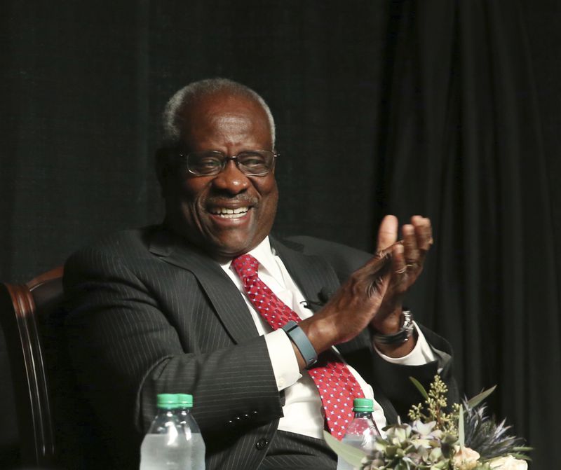 U.S. Supreme Court Justice Clarence Thomas laughs before speaking to an audience at McLennan Community College in Waco, Texas, Thursday, Sept. 7, 2017. (Rod Aydelotte/Waco Tribune-Herald via AP)
