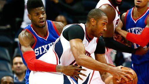 What would the Hawks' acquisition of Philadelphia's Nerlens Noel (left) mean for free agent Al Horford and power forward Paul Millsap (not pictured)? (Kevin C. Cox/Getty Images)