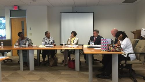 The DeKalb County Board of Ethics during its May 15 meeting. From left: Board members Edwinett Fay Perkins-Murphy, Clara Black-Delay, Susan Neugent and John Ernst; Gene Chapman, the board’s attorney; and Jennifer Johnson, the board’s administrator. MARK NIESSE / MARK.NIESSE@AJC.COM