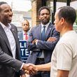 Fulton County Commissioner Candidate Ali Carter and Atlanta Mayor Andre Dickens meet supporters during local campaigning on Thursday, May 9, 2024, in the Cascade Heights neighborhood of Atlanta. (Atlanta Journal-Constitution/Jason Allen)