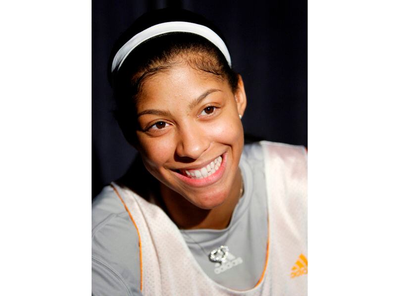 FILE -- In this March 31, 2008 file photo, Tennessee's Candice Parker smiles and answers questions from reporters during a press conference for the Oklahoma City Regional NCAA Women's Basketball Tournament in Oklahoma City.  The three-time WNBA champion announced her retirement. Parker, a two-time league MVP, announced in a social media post on Sunday, April 28, 2024, that she is ending her 16-season career.  (AP Photo/Sue Ogrocki, File)